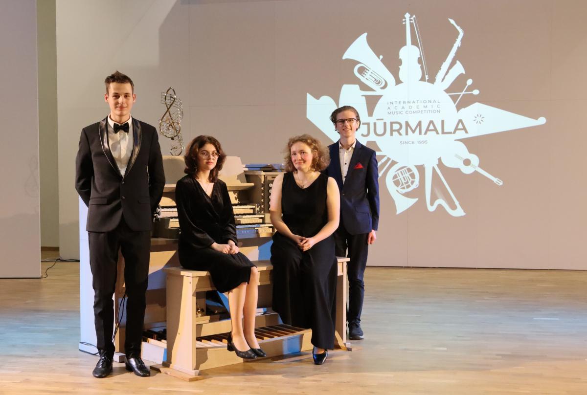 C-grupas dalibniekie un laureati
